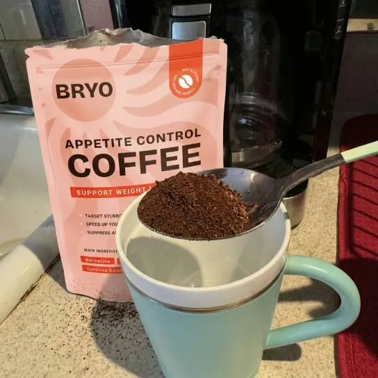 A BRYO customer enjoying her morning coffee